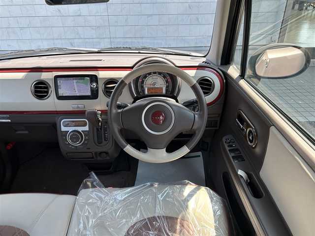 スズキ ラパン ショコラ X 埼玉県 2014(平26)年 7.7万km ピンク 純正ナビオーディオ/（AM/FM/BT/iPod/AUX/SD）/ワンセグテレビ/バックカメラ/アイドリングストップ/ドライブレコーダー前後/スペアキー１本（スマートキー）/プッシュスタード/純正フロアマット/保証書/車両/ナビ 取扱説明書