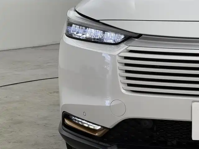 ホンダ ヴェゼル ハイブリッド e:HEV X HuNTパッケージ 福岡県 2024(令6)年 0.7万km プラチナホワイトパール 純正９型ナビ　/バックカメラ　/ＥＴＣ　/アダプティブクルコン　/コーナーセンサー　/衝突軽減ブレーキ　/レーンキープ　/アクセル踏み間違い防止　/ヒルディセントコントロール　/パドルシフト　/純正１６インチＡＷ　/ＬＥＤヘッドライト