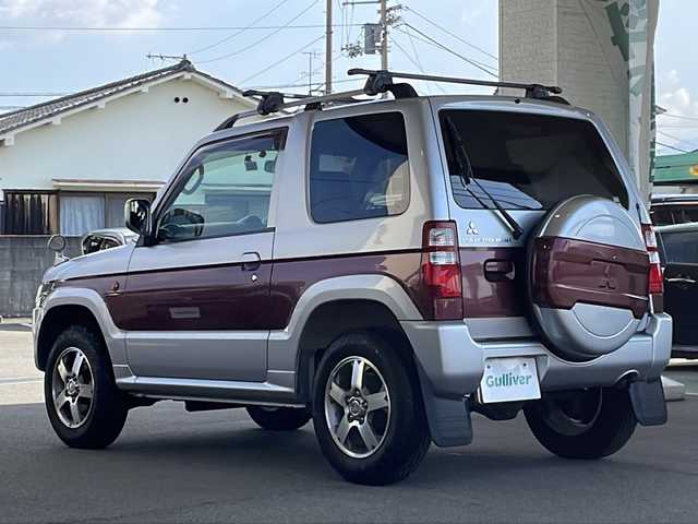 三菱 パジェロ ミニ エクシード 愛媛県 2009(平21)年 11.9万km クールシルバーメタリック 社外ナビ(CN-E310D)/ドライブレコーダー/ワンセグテレビ/ＥＴＣ/背面タイヤ/ルーフレール/純正アルミホイール/リモコンキー/スペアキー/純正フロアマット