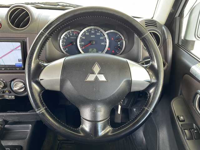 三菱 パジェロ ミニ エクシード 愛媛県 2009(平21)年 11.9万km クールシルバーメタリック 社外ナビ(CN-E310D)/ドライブレコーダー/ワンセグテレビ/ＥＴＣ/背面タイヤ/ルーフレール/純正アルミホイール/リモコンキー/スペアキー/純正フロアマット