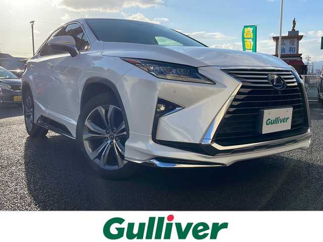 レクサス ＲＸ 450h バージョンL 山形県 2019(平31)年 5.9万km ソニッククォーツ ・モデリスタエアロ（フロント、サイド、リア）/・サンルーフ/・リアエンターテイメントシステム/・４WD/・純正ナビ/フルセグ/CDDVDブルーレイ/Bluetooth/・全方位カメラ/・社外前後ドラレコ/・ビルトインETC2.0/・MTモード付きAT/・レーダークルーズコントロール/・レーンキープアシスト/・プリクラッシュセーフティ/・ブラインドスポットモニター/・前後クリアランスソナー/・ヘッドアップディスプレイ/・前席パワーシート（メモリー付き）、シートベンチレーション/・全席シートヒーター/・ステアリングヒーター/・電動テレスコピック、オートスライドアウェイ/・パワーバックドア/・電動格納セカンドシート/・置くだけ充電/・シーケンシャルウィンカー/・20インチ純正AW/・18インチ純正AW＋スタッドレスタイヤ車載/・純正マット/・カードキー1枚
