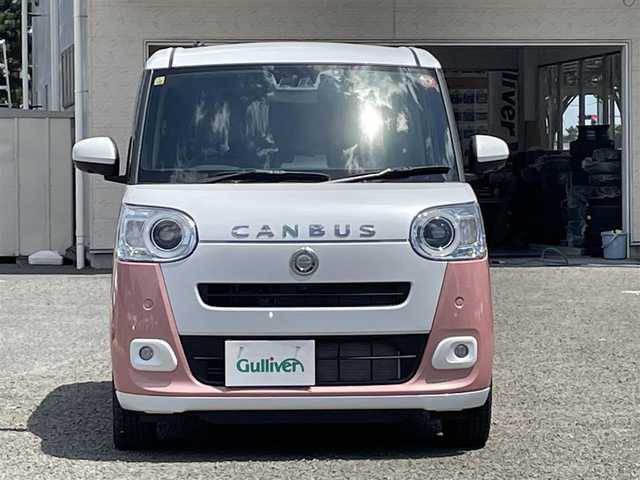 ダイハツ ムーヴ キャンバス ストライプス G 宮城県 2023(令5)年 0.2万km シャイニングホワイトパール/アプリコットピンクメタリック 純正10インチメモリナビ/CD/DVD/FM/AM/HDMI/BT/USB/SD/アラウンドビューモニター/シートヒーターDN席/カップウォーマーDN席/両側パワースライドドア/純正ドライブレコーダー/純正フロアマット/ブレーキホールド/アイドリングストップ/衝突被害軽減ブレーキ/パーキングセンサー/同サイズサマータイヤ積込/スマートキーx2