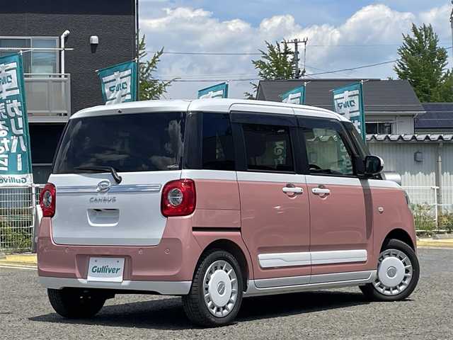 ダイハツ ムーヴ キャンバス ストライプス G 宮城県 2023(令5)年 0.2万km シャイニングホワイトパール/アプリコットピンクメタリック 純正10インチメモリナビ/CD/DVD/FM/AM/HDMI/BT/USB/SD/アラウンドビューモニター/シートヒーターDN席/カップウォーマーDN席/両側パワースライドドア/純正ドライブレコーダー/純正フロアマット/ブレーキホールド/アイドリングストップ/衝突被害軽減ブレーキ/パーキングセンサー/同サイズサマータイヤ積込/スマートキーx2