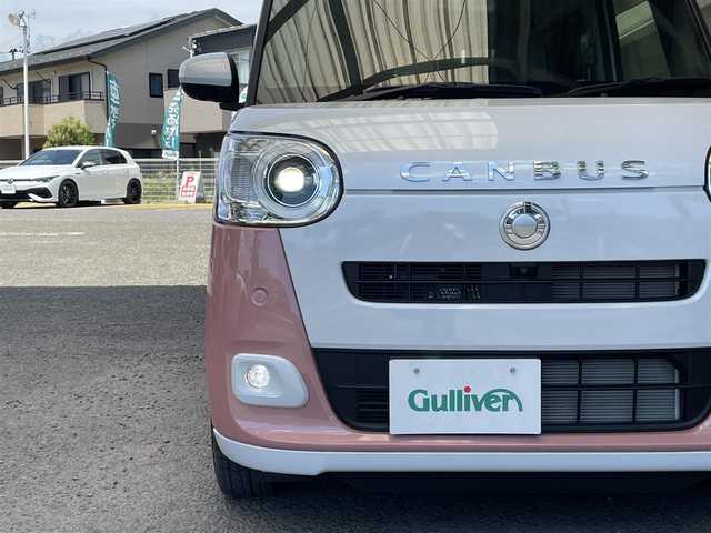 ダイハツ ムーヴ キャンバス ストライプス G 宮城県 2023(令5)年 0.2万km シャイニングホワイトパール/アプリコットピンクメタリック 純正10インチメモリナビ/CD/DVD/FM/AM/HDMI/BT/USB/SD/アラウンドビューモニター/シートヒーターDN席/カップウォーマーDN席/両側パワースライドドア/純正ドライブレコーダー/純正フロアマット/ブレーキホールド/アイドリングストップ/衝突被害軽減ブレーキ/パーキングセンサー/同サイズサマータイヤ積込/スマートキーx2