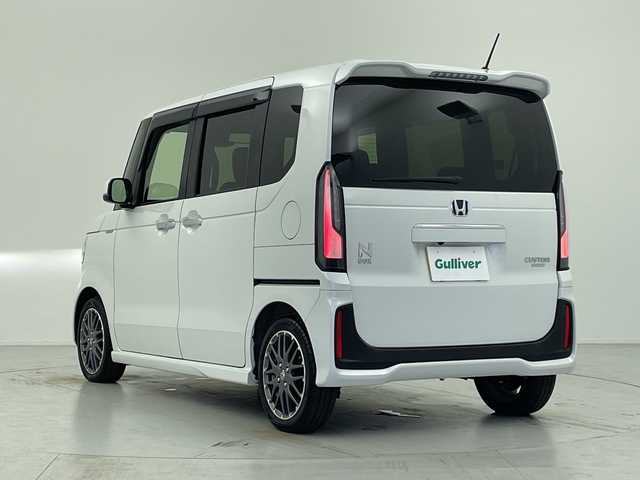 ホンダ Ｎ ＢＯＸ カスタム ターボ 愛知県 2024(令6)年 1.1万km プラチナホワイトパール ターボ搭載車/ホンダセンシング/・衝突軽減ブレーキ/・先行車発進のお知らせ/・歩行者事故低減ステアリング/・路外逸脱抑制機能/・標識認識システム/・アダプティブクルーズコントロール/・オートハイビーム/・誤発進抑制機能/・後方誤発進抑制機能/・近距離衝突軽減ブレーキ/パーキングセンサー/純正8インチディスプレイオーディオ/Apple CarPlay/Android Auto/バックカメラ/純正アルミホイール/ETC/シートヒーター/スマートキー/プッシュスタート/横滑り防止装置/パドルシフト