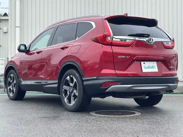ホンダ ＣＲ－Ｖ ハイブリッド EX・マスターピース 富山県 2019(令1)年 3.7万km プレミアムクリスタルレッドM 純正ナビ/フルセグTV/ハンズフリーパワーバックドア/バックモニター/ビルトインETC2.0/ドライブレコーダー/レーダークルーズコントロール/衝突被害軽減ブレーキ/誤発進抑制機能/車線逸脱防止支援システム/先行車発進お知らせ機能/オートハイビーム/標識認識システム/ブラインドスポットモニター/LEDヘッドランプ/革巻きステアリング/パドルシフト/ブラウン革シート/前席パワーシート/シートヒーター/純正18インチアルミホイール/スマートキーシステム/禁煙車
