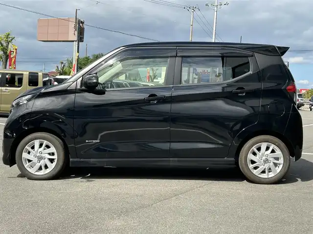 日産 デイズ ハイウェイスターX 愛媛県 2022(令4)年 1.7万km ブラック 純正9型ナビ/バックカメラ/セーフティシールド/衝突被害軽減装置/車線逸脱防止装置/純正ドライブレコーダー/アイドリングストップ/クリアランスソナー/ステアリングリモコン/ヘッドライトレベライザー/純正ドアバイザー/USB充電/オートマチックハイビーム/LEDヘッドライト/ETC/電格ミラー/現状サマー(純正AW)(155/65/R14)/BRIDGESTONE EcoPia EP150/禁煙車