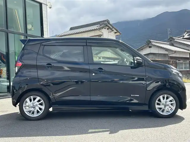 日産 デイズ ハイウェイスターX 愛媛県 2022(令4)年 1.7万km ブラック 純正9型ナビ/バックカメラ/セーフティシールド/衝突被害軽減装置/車線逸脱防止装置/純正ドライブレコーダー/アイドリングストップ/クリアランスソナー/ステアリングリモコン/ヘッドライトレベライザー/純正ドアバイザー/USB充電/オートマチックハイビーム/LEDヘッドライト/ETC/電格ミラー/現状サマー(純正AW)(155/65/R14)/BRIDGESTONE EcoPia EP150/禁煙車