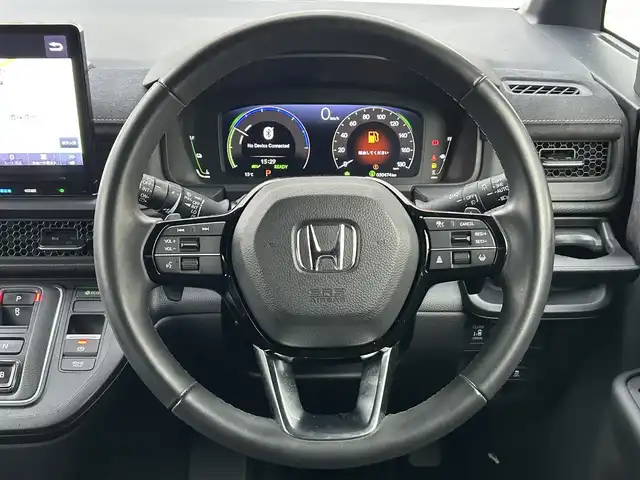 ホンダ ステップワゴン スパーダ eHEV プレミアムライン 福岡県 2023(令5)年 3.1万km クリスタルブラックパール 純正11.4インチメモリナビ/　（AM/FM/CD/DVD/Bluetooth/フルセグTV）/フロント/サイド/バックカメラ/マルチビューカメラシステム/ホンダセンシング/・衝突軽減ブレーキ/・踏み間違い衝突軽減システム/・歩行者事故低減ステアリング/・路外逸脱抑制機能/・先行車発進お知らせ機能/・標識認識機能/・アダプティブクルーズコントロール/・トラフィックジャムアシスト/・車線維持支援システム/クリアランスソナー/コーナーセンサー/横滑り防止装置/ブラインドスポッドモニター/オートライト/純正17インチAW/両側パワースライドドア/パワーバックドア/黒色ハーフレザーシート/シートヒーター（D/N）/パドルシフト/ビルトインETC/前後ドライブレコーダー【DRH-229ND】/オットマン/後席サンシェード/折り畳み式ドリンクテーブル/電格ウインカーミラー/純正フロアマット/ISOFIX/電源ソケット×1/USB-C端子×3/スペアキー×1/保証書/取扱説明書/ナビ取扱説明書