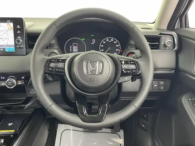 ホンダ ヴェゼル ハイブリッド e:HEV Z 大分県 2025(令7)年 0.1千km プラチナホワイトパール 登録済未使用車/純正ディスプレイオーディオ/フルセグTV/Bluetooth/applecarplay/androidauto/シートヒーター（D/N）/置くだけ充電/ETC2.0/オートホールド/電子パーキング/ステアリングヒーター/パワーバックドア/オートライト/ホンダセンシング/・レーダークルーズコントロール/・オートハイビーム/・衝突軽減ブレーキ/・BSM