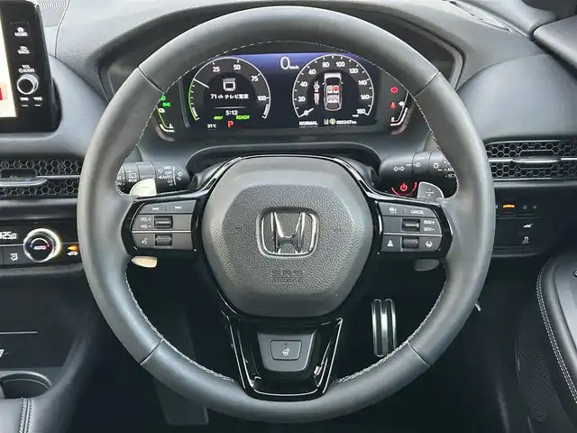 ホンダ ＺＲ－Ｖ ハイブリッド e:HEV Z ブラックスタイル 茨城県 2024(令6)年 0.6万km スーパープラチナグレーメタリック 本革シート/前席シートヒーター/前席パワーシート/純正インターナビ・フルセグTV/バックカメラ/BOSEサラウンドシステム/パワーバックドア/ホンダセンシング/　衝突軽減ブレーキ/　後方誤発進抑制機能/　歩行者事故低減ステアリング/　渋滞追従機能付アダプティブクルーズコントロール/　車線維持支援システム/　先行車発進お知らせ機能/　標識認識機能/　ブラインドスポットインフォメーション/　誤発進抑制機能/　近距離衝突軽減ブレーキ/　路外逸脱抑制機能/　トラフィックジャムアシスト/　パーキングセンサーシステム/純正１８インチアルミホイール/ワイヤレス充電器/パドルシフト/ステアリングヒーター/LEDヘッドライト/プッシュスタート/ビルトインETC2.0