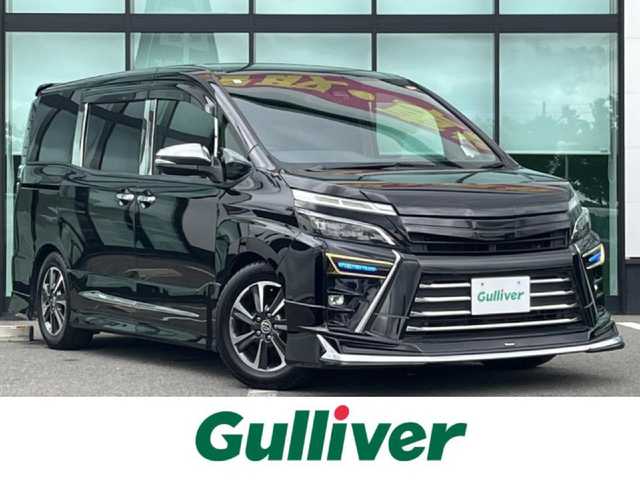 トヨタ ヴォクシー ZS 煌 和歌山県 2019(平31)年 6.9万km ブラック モデリスタエアロ/モデリスタシグネチャーイルミブレード/純正１０インチナビ/バックカメラ/フルセグTV/純正12.1型フリップダウンモニター/純正前後ドライブレコーダー/プリクラッシュセーフティー/クルーズコントロール/社外グリル/車高調/後席サンシェード/LEDヘッドライト/オートライト/オートマチックハイビーム