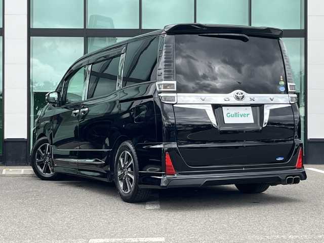 トヨタ ヴォクシー ZS 煌 和歌山県 2019(平31)年 6.9万km ブラック モデリスタエアロ/モデリスタシグネチャーイルミブレード/純正１０インチナビ/バックカメラ/フルセグTV/純正12.1型フリップダウンモニター/純正前後ドライブレコーダー/プリクラッシュセーフティー/クルーズコントロール/社外グリル/車高調/後席サンシェード/LEDヘッドライト/オートライト/オートマチックハイビーム