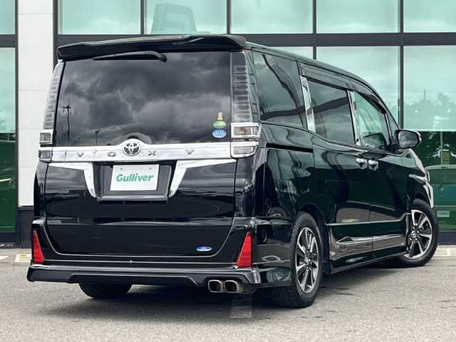 トヨタ ヴォクシー ZS 煌 和歌山県 2019(平31)年 6.9万km ブラック モデリスタエアロ/モデリスタシグネチャーイルミブレード/純正１０インチナビ/バックカメラ/フルセグTV/純正12.1型フリップダウンモニター/純正前後ドライブレコーダー/プリクラッシュセーフティー/クルーズコントロール/社外グリル/車高調/後席サンシェード/LEDヘッドライト/オートライト/オートマチックハイビーム