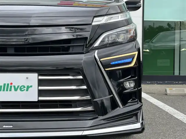 トヨタ ヴォクシー ZS 煌 和歌山県 2019(平31)年 6.9万km ブラック モデリスタエアロ/モデリスタシグネチャーイルミブレード/純正１０インチナビ/バックカメラ/フルセグTV/純正12.1型フリップダウンモニター/純正前後ドライブレコーダー/プリクラッシュセーフティー/クルーズコントロール/社外グリル/車高調/後席サンシェード/LEDヘッドライト/オートライト/オートマチックハイビーム