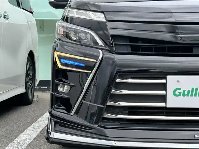 トヨタ ヴォクシー ZS 煌 和歌山県 2019(平31)年 6.9万km ブラック モデリスタエアロ/モデリスタシグネチャーイルミブレード/純正１０インチナビ/バックカメラ/フルセグTV/純正12.1型フリップダウンモニター/純正前後ドライブレコーダー/プリクラッシュセーフティー/クルーズコントロール/社外グリル/車高調/後席サンシェード/LEDヘッドライト/オートライト/オートマチックハイビーム