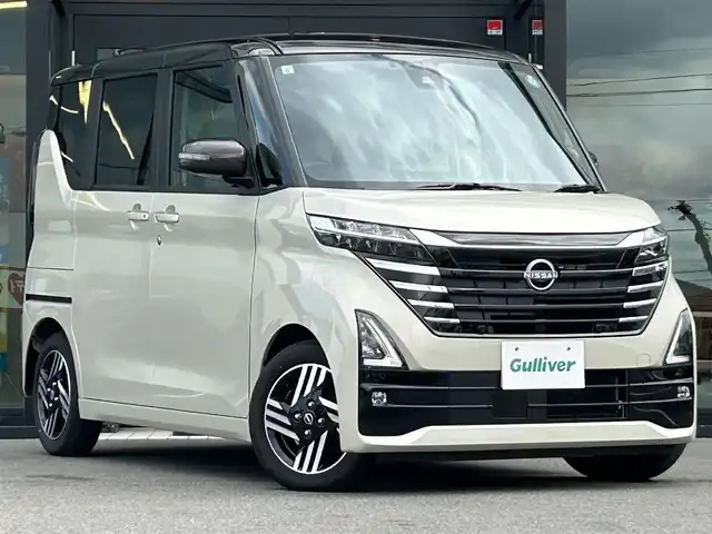 日産 ルークス ハイウェイスター X 愛媛県 2024(令6)年 0.9万km フローズンバニラパール/アッシュブラウンM 純正9型ナビ/全周囲カメラ/両側電動スライドドア/左側ハンズフリースライド/インテリジェントルームミラー/セーフティシールド/衝突被害軽減装置/車線逸脱防止装置/クリアランスソナー/リアサーキュレーター/後席サンシェイド/LEDヘッドライト/アイドリングストップ/ステアリングリモコン/電格ミラー/ヘッドライトレベライザー/シガーソケット/現状サマー(純正AW)(155/65/R14)/BRIDGESTONE EcoPia/禁煙車