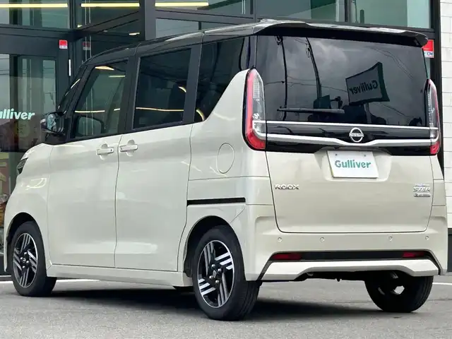 日産 ルークス ハイウェイスター X 愛媛県 2024(令6)年 0.9万km フローズンバニラパール/アッシュブラウンM 純正9型ナビ/全周囲カメラ/両側電動スライドドア/左側ハンズフリースライド/インテリジェントルームミラー/セーフティシールド/衝突被害軽減装置/車線逸脱防止装置/クリアランスソナー/リアサーキュレーター/後席サンシェイド/LEDヘッドライト/アイドリングストップ/ステアリングリモコン/電格ミラー/ヘッドライトレベライザー/シガーソケット/現状サマー(純正AW)(155/65/R14)/BRIDGESTONE EcoPia/禁煙車