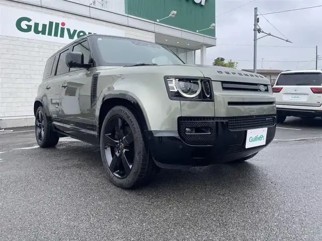ランドローバー ランドローバー ディフェンダー 110XダイナミッHSE 神奈川県 2023(令5)年 0.5万km 緑Ⅱ ワンオーナー/11.4インチタッチスクリーン/　・全方位カメラ/　・BT/AppleCarPlay/AndroidAuto/メーカーOP/　・オプション総額約190万/　・22インチグロスブラックAW/　・22インチスペアホイール/　・エアサスペンションパック/　・コールドクライメイトパック/　・エクステンドブラックエクステリアパック/　・電子制御アクティブディファレンシャル/　・プライバシーガラス/　・HUD/　・リアシート（ヒーター＆アームレスト付き）/　・メタリックカラー（カフー）/　・クロスカービーム（ダークグレイパウダーコート）/　・インテリアパネル（ラフカットウォールナット）/　・グロスブラックシグネチャーグラフィック/スライディングパノラミックルーフ/MERIDIANサウンドシステム/パンゲアグリーン/前席/　・パワーシート/　・シートヒーター＆シートベンチレーション/純正前後ドラレコ/純正ビルトインETC2.0/スマートキー×2/取扱説明書/整備記録簿