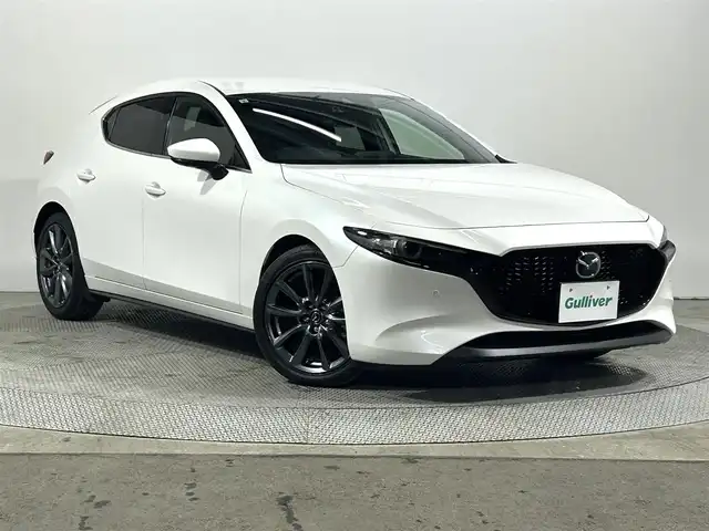 マツダ マツダ３ファストバック 大阪府 2019(令1)年 1.6万km スノーフレイクホワイトパールマイカ 純正ナビ　/３６０°カメラ　/レーダークルーズ　/衝突軽減ブレーキ　/レーンアシスト　/フルセグＴＶ　/ブラインドスポットモニター　/クリアランスソナー　/ＬＥＤヘッドライト　/スマートキー　/ＨＤＭＩ　/ＵＳＢ　/ＥＴＣ