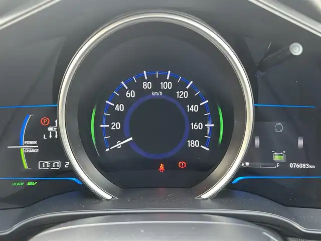ホンダ フィット ハイブリット Lパッケージ 兵庫県 2014(平26)年 7.6万km ビビットスカイブルーP 純正7インチSDナビ/BT/ワンセグ/CD/DVD/ETC/クルーズコントロール/ドアバイザー/ハーフレザーシート/革巻ステアリング/純正フロアマット/ABS/横滑り防止装置