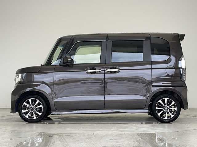 ホンダ Ｎ ＢＯＸ カスタム G L ホンダセンシング 愛知県 2020(令2)年 4.9万km プレミアムグラマラスブロンズP 衝突被害軽減ブレーキ/純正7インチSD（ナビあり）/クルーズコントロール/シートヒーター/フルセグTV/CD DVD/Bluetooth/バックカメラ/コーナーセンサー/純正アルミホイール/パワースライドドア/LEDヘッドライト/オートマチックハイビーム/ドライブレコーダー/ETC/ステアリングスイッチ/スマートキー/プッシュスタート