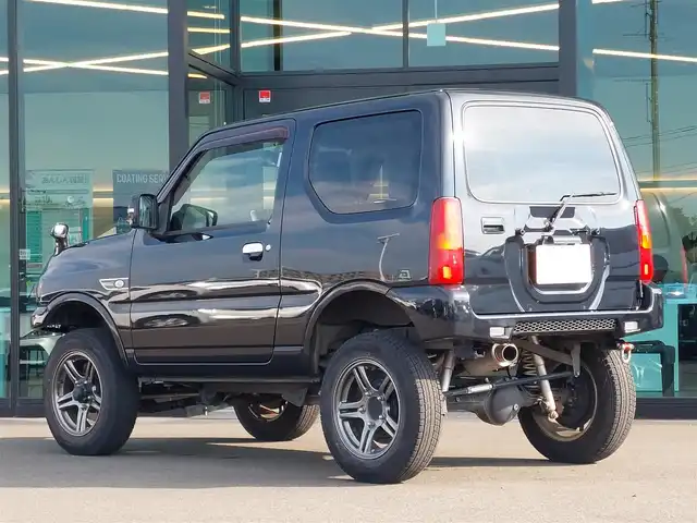 スズキ ジムニー ランドベンチャー 石川県 2017(平29)年 8.6万km ブルーイッシュブラックパール3 ４WD/KENWOODナビ/・フルセグTV/・Bluetooth/サスペンションキット（TANIGICHI）/社外マフラー（Links）/ブースト計（AUTOGAUGE）/純正フロアマット/純正16インチアルミホイール/ハーフレザーシート/シートヒーター/ドアバイザー/電動格納ミラー/リモコンキー