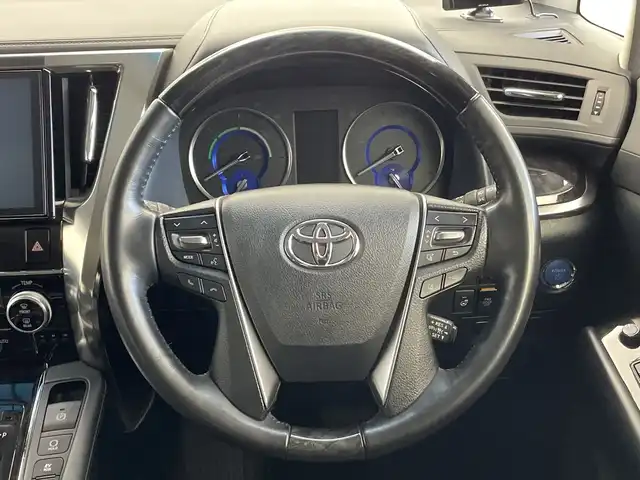 トヨタ ヴェルファイア ハイブリット ZR Gエディション 新潟県 2018(平30)年 6.4万km バーニングブラッククリスタルシャインガラスフレーク 禁煙車/４WD/純正メモリナビ/（BT/FM/AM/フルセグTV)/バック・フロントカメラ/ステアリングスイッチ/ステアリングヒーター/レザーシート/パワーシート/シートヒーター/ベンチレーション/オットマン/ドライブレコーダー/フリップダウンモニター/サンルーフ/純正LEDオートヘッドライト/サンシェード/電格ミラー/シーケンシャルウィンカー/ウィンカーミラー/ETC/取扱説明書