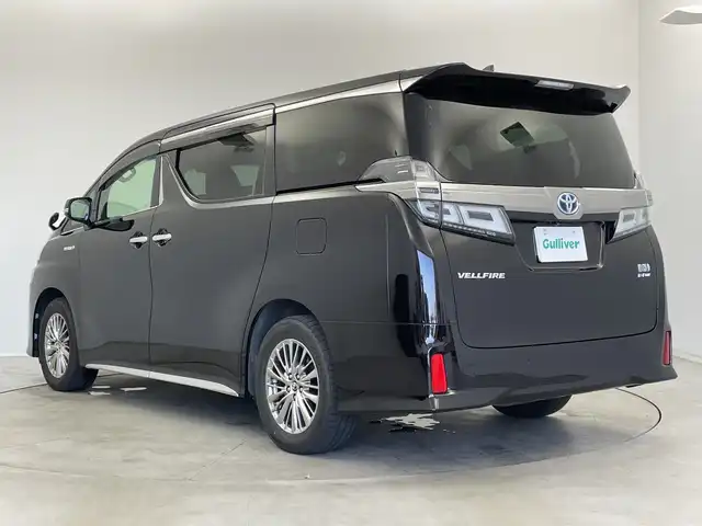 トヨタ ヴェルファイア ハイブリット ZR Gエディション 新潟県 2018(平30)年 6.4万km バーニングブラッククリスタルシャインガラスフレーク 禁煙車/４WD/純正メモリナビ/（BT/FM/AM/フルセグTV)/バック・フロントカメラ/ステアリングスイッチ/ステアリングヒーター/レザーシート/パワーシート/シートヒーター/ベンチレーション/オットマン/ドライブレコーダー/フリップダウンモニター/サンルーフ/純正LEDオートヘッドライト/サンシェード/電格ミラー/シーケンシャルウィンカー/ウィンカーミラー/ETC/取扱説明書