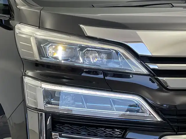 トヨタ ヴェルファイア ハイブリット ZR Gエディション 新潟県 2018(平30)年 6.4万km バーニングブラッククリスタルシャインガラスフレーク 禁煙車/４WD/純正メモリナビ/（BT/FM/AM/フルセグTV)/バック・フロントカメラ/ステアリングスイッチ/ステアリングヒーター/レザーシート/パワーシート/シートヒーター/ベンチレーション/オットマン/ドライブレコーダー/フリップダウンモニター/サンルーフ/純正LEDオートヘッドライト/サンシェード/電格ミラー/シーケンシャルウィンカー/ウィンカーミラー/ETC/取扱説明書