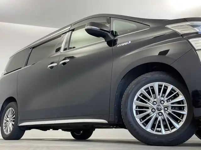 トヨタ ヴェルファイア ハイブリット ZR Gエディション 新潟県 2018(平30)年 6.4万km バーニングブラッククリスタルシャインガラスフレーク 禁煙車/４WD/純正メモリナビ/（BT/FM/AM/フルセグTV)/バック・フロントカメラ/ステアリングスイッチ/ステアリングヒーター/レザーシート/パワーシート/シートヒーター/ベンチレーション/オットマン/ドライブレコーダー/フリップダウンモニター/サンルーフ/純正LEDオートヘッドライト/サンシェード/電格ミラー/シーケンシャルウィンカー/ウィンカーミラー/ETC/取扱説明書