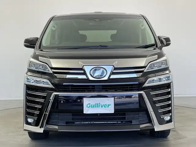 トヨタ ヴェルファイア ハイブリット ZR Gエディション 新潟県 2018(平30)年 6.4万km バーニングブラッククリスタルシャインガラスフレーク 禁煙車/４WD/純正メモリナビ/（BT/FM/AM/フルセグTV)/バック・フロントカメラ/ステアリングスイッチ/ステアリングヒーター/レザーシート/パワーシート/シートヒーター/ベンチレーション/オットマン/ドライブレコーダー/フリップダウンモニター/サンルーフ/純正LEDオートヘッドライト/サンシェード/電格ミラー/シーケンシャルウィンカー/ウィンカーミラー/ETC/取扱説明書