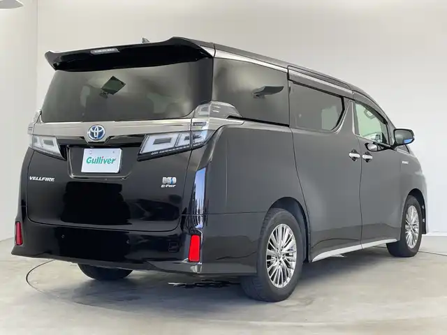 トヨタ ヴェルファイア ハイブリット ZR Gエディション 新潟県 2018(平30)年 6.4万km バーニングブラッククリスタルシャインガラスフレーク 禁煙車/４WD/純正メモリナビ/（BT/FM/AM/フルセグTV)/バック・フロントカメラ/ステアリングスイッチ/ステアリングヒーター/レザーシート/パワーシート/シートヒーター/ベンチレーション/オットマン/ドライブレコーダー/フリップダウンモニター/サンルーフ/純正LEDオートヘッドライト/サンシェード/電格ミラー/シーケンシャルウィンカー/ウィンカーミラー/ETC/取扱説明書
