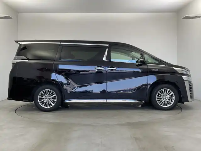 トヨタ ヴェルファイア ハイブリット ZR Gエディション 新潟県 2018(平30)年 6.4万km バーニングブラッククリスタルシャインガラスフレーク 禁煙車/４WD/純正メモリナビ/（BT/FM/AM/フルセグTV)/バック・フロントカメラ/ステアリングスイッチ/ステアリングヒーター/レザーシート/パワーシート/シートヒーター/ベンチレーション/オットマン/ドライブレコーダー/フリップダウンモニター/サンルーフ/純正LEDオートヘッドライト/サンシェード/電格ミラー/シーケンシャルウィンカー/ウィンカーミラー/ETC/取扱説明書