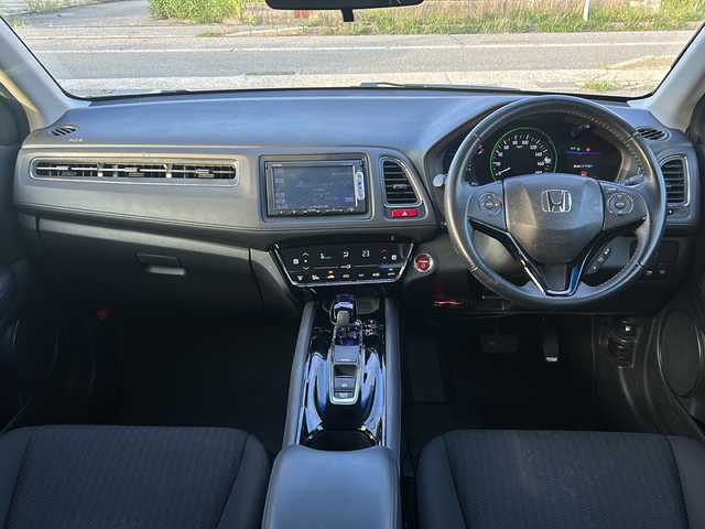 ホンダ ヴェゼル ハイブリッド X 石川県 2014(平26)年 7.3万km ミスティックグリーンパール VSA (VSA・Vehicle Stability Assist)/・EBD（電子制動力配分装置）付ABS/・衝突安全ボディー/・衝突被害軽減/純正メモリナビゲーション/【CD・DVD・Bluetooth・ワンセグTV】/型番：VXM-145VFi/クルーズコントロール/バックカメラ/パドルシフト/ドライブレコーダー/ETC/LEDヘッドライト/・オートライト/・フォグランプ/プッシュスタート/・スマートキー/純正フロアマット/純正16インチAW