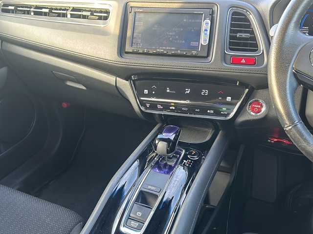 ホンダ ヴェゼル ハイブリッド X 石川県 2014(平26)年 7.3万km ミスティックグリーンパール VSA (VSA・Vehicle Stability Assist)/・EBD（電子制動力配分装置）付ABS/・衝突安全ボディー/・衝突被害軽減/純正メモリナビゲーション/【CD・DVD・Bluetooth・ワンセグTV】/型番：VXM-145VFi/クルーズコントロール/バックカメラ/パドルシフト/ドライブレコーダー/ETC/LEDヘッドライト/・オートライト/・フォグランプ/プッシュスタート/・スマートキー/純正フロアマット/純正16インチAW