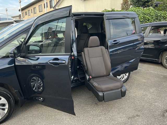 ホンダ フリード G ホンダセンシング 福島県 2020(令2)年 2.9万km ミッドナイトブルービームM 4WD 福祉車両 サイドリフトアップシート 純正ナビ フルセグTV Bluetooth バックカメラ ホンダセンシング 両側パワースライドドア オートクルーズ ETC シートヒーター スマートキー