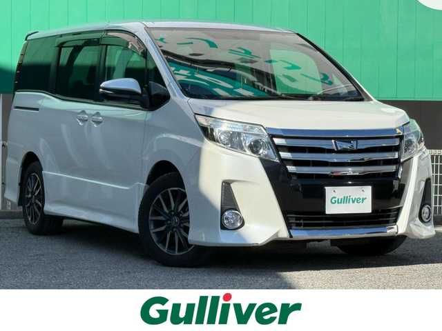 トヨタ ノア Si 千葉県 2014(平26)年 8.1万km ホワイトパールクリスタルシャイン ９インチ純正フルセグナビ（ＮＳＺＴ－Ｙ６２Ｇ）/両側パワースライド/バックカメラ/ＥＴＣ/前後ドライブレコーダー/ステアリングスイッチ/純正フロアマット/ステアリングスイッチ/アイドリングストップ/後席サンシェード/DUALエアコン/オートライト/スペアキー1本