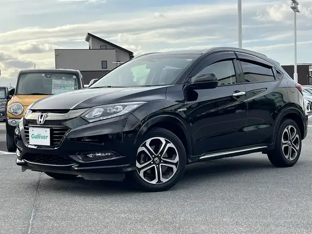 ホンダ ヴェゼル ハイブリッド Z ホンダセンシング 奈良県 2018(平30)年 6.7万km クリスタルブラックパール 純正ナビ(VXM-185VFi)/（フルセグ/BT/CD/DVD）/レーダークルーズコントロール/バックカメラ/パドルシフト/衝突軽減システム/レーンキープアシスト/ハーフレザーシート/前席シートヒーター/LEDヘッドライト/オートライト/電動格納ミラー/ETC/純正17インチAW/保証書/取り扱い説明書/スペアキーX1