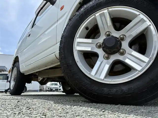 マツダ ＡＺ オフロード XC 熊本県 2010(平22)年 12万km スペリアホワイト 4WD/IC付ターボ/ルーフレール/社外メモリナビ(NVA-MS3109)/【ワンセグTV/CD】/社外16インチアルミホイール/ETC/純正フロアマット/ベンチシート/パワーステアリング/ダブルエアバッグ/パワーウインドウ/ABS/取扱説明書/保証書