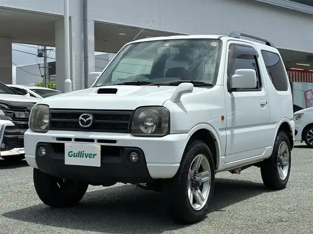 マツダ ＡＺ オフロード XC 熊本県 2010(平22)年 12万km スペリアホワイト 4WD/IC付ターボ/ルーフレール/社外メモリナビ(NVA-MS3109)/【ワンセグTV/CD】/社外16インチアルミホイール/ETC/純正フロアマット/ベンチシート/パワーステアリング/ダブルエアバッグ/パワーウインドウ/ABS/取扱説明書/保証書