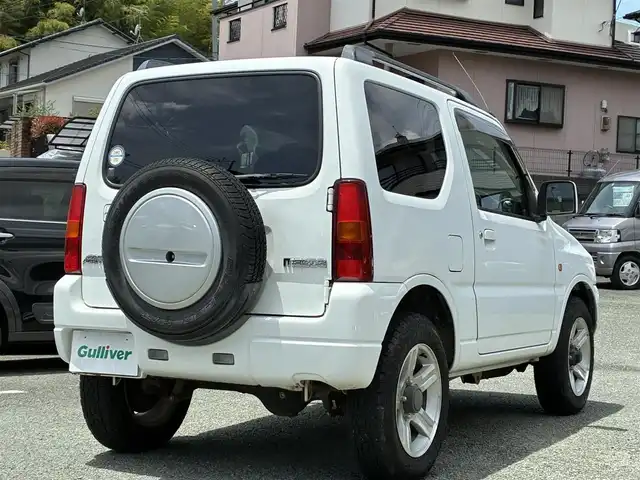 マツダ ＡＺ オフロード XC 熊本県 2010(平22)年 12万km スペリアホワイト 4WD/IC付ターボ/ルーフレール/社外メモリナビ(NVA-MS3109)/【ワンセグTV/CD】/社外16インチアルミホイール/ETC/純正フロアマット/ベンチシート/パワーステアリング/ダブルエアバッグ/パワーウインドウ/ABS/取扱説明書/保証書