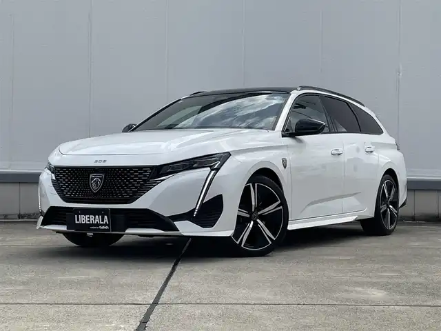 プジョー プジョー ３０８ SW GT ブルーHDi 東京都 2023(令5)年 2.3万km 白 純正ナビ/USB/Bluetooth/純正ミラースクリーン/アンビエントライト/360°カメラ/前後ドライブレコーダー/ETC/ACC/BSM/LKA/サンルーフ/ワイヤレス充電/ハーフレザーシート/シートヒーター/パワーバックドア