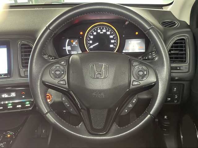 ホンダ ヴェゼル ハイブリッド X ホンダセンシング 広島県 2020(令2)年 2万km ミッドナイトブルービームM 禁煙車/純正８型ナビ/バックカメラ/レーダークルーズコントロール/自動防眼ミラー/パドルシフト/ＥＴＣ/ドラレコ/衝突被害軽減/レーンキープアシスト/ＬＥＤヘッドライト/ホールド機能付電動パーキングブレーキ/エアバッグ(運転席/助手席/サイド/カーテン)/純正16インチアルミホイール(215/60/R16)