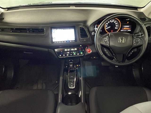 ホンダ ヴェゼル ハイブリッド X ホンダセンシング 広島県 2020(令2)年 2万km ミッドナイトブルービームM 禁煙車/純正８型ナビ/バックカメラ/レーダークルーズコントロール/自動防眼ミラー/パドルシフト/ＥＴＣ/ドラレコ/衝突被害軽減/レーンキープアシスト/ＬＥＤヘッドライト/ホールド機能付電動パーキングブレーキ/エアバッグ(運転席/助手席/サイド/カーテン)/純正16インチアルミホイール(215/60/R16)