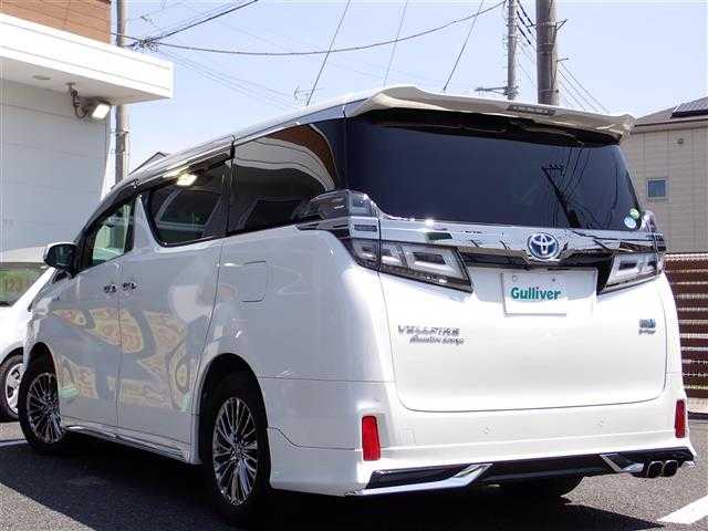 トヨタ ヴェルファイア ハイブリット エグゼクティブ ラウンジ Z 千葉県 2019(令1)年 5.1万km ホワイトパールクリスタルシャイン サンルーフ/モデリスタエアロ（F/S/R）/メーカーナビゲーション/・Bluetooth/CD/DVD/AM/FM/フルセグTV/パノラミックビューモニター/デジタルインナーミラー/ブラインドスポットモニター/JBLサウンドシステム/純正フリップダウンモニター/360度ドライブレコーダー/2.0ETCビルトインタイプ/Toyota Safety Sense/・プリクラッシュセーフティ/・レーントレーシングアシスト/・アダプティブハイビームシステム/・オートマチックハイビーム/・ロードサインアシスト/・レーダークルーズコントロール/・先行車発進告知機能/ステアリングヒーター/ステアリングスイッチ/黒レザーシート/パワーシート/シートヒーター/エアシート/パワーバックドア/LEDヘッドライト/オートライト/フォグライト/プッシュスタート/スマートキー2本/両側パワースライドドア/純正17インチAW/ウィンカーミラー/電動格納ミラー/純正フロアマット/ドアバイザー/取扱説明書/保証書/ナビ取扱説明書