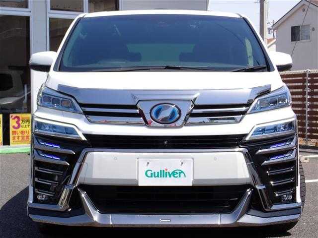 トヨタ ヴェルファイア ハイブリット エグゼクティブ ラウンジ Z 千葉県 2019(令1)年 5.1万km ホワイトパールクリスタルシャイン サンルーフ/モデリスタエアロ（F/S/R）/メーカーナビゲーション/・Bluetooth/CD/DVD/AM/FM/フルセグTV/パノラミックビューモニター/デジタルインナーミラー/ブラインドスポットモニター/JBLサウンドシステム/純正フリップダウンモニター/360度ドライブレコーダー/2.0ETCビルトインタイプ/Toyota Safety Sense/・プリクラッシュセーフティ/・レーントレーシングアシスト/・アダプティブハイビームシステム/・オートマチックハイビーム/・ロードサインアシスト/・レーダークルーズコントロール/・先行車発進告知機能/ステアリングヒーター/ステアリングスイッチ/黒レザーシート/パワーシート/シートヒーター/エアシート/パワーバックドア/LEDヘッドライト/オートライト/フォグライト/プッシュスタート/スマートキー2本/両側パワースライドドア/純正17インチAW/ウィンカーミラー/電動格納ミラー/純正フロアマット/ドアバイザー/取扱説明書/保証書/ナビ取扱説明書