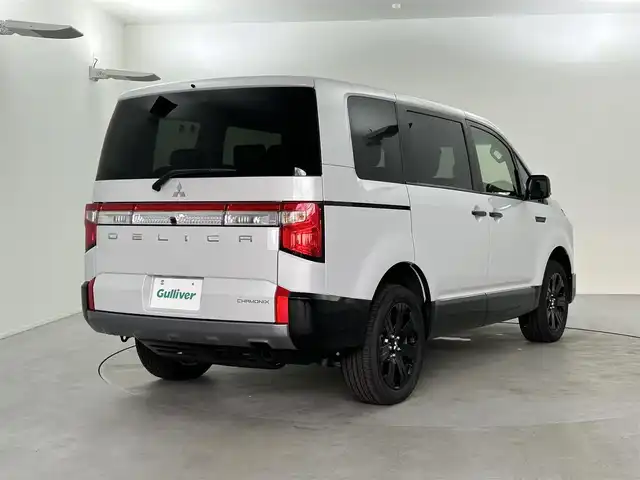 三菱 デリカＤ：５ シャモニー 福井県 2025(令7)年 0.1千km 白Ⅱ 4WD/届出済未使用車/アダプティブクルーズコントロール/レーンキープアシスト/車線逸脱警報/衝突軽減ブレーキ/ブラインドスポットモニター/両側パワースライドドア/パワーバックドア/ハーフレザーシート/前席シートヒーター/運転席パワーシート/ステアリングヒーター/パドルシフト/MTモード付AT/LEDヘッドライト/オートライト/オートマチックハイビーム/リアフォグランプ/電動格納ミラー/ウィンカーミラー/電動ホールド/オートホールド/純正18インチAW装着/プッシュスタート/スマートキー/スペアキー1本/取扱説明書/保証書/オリジナルナビ取付パッケージ＋リアモニター取付パッケージ