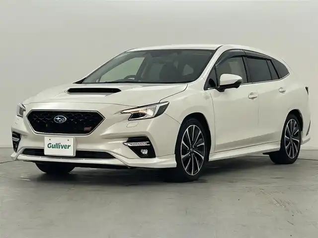 スバル レヴォーグ 1．8STIスポーツ 群馬県 2021(令3)年 3万km クリスタルホワイトP （フロント/リヤアンダー）エアロ/視界拡張テクノロジー/・デジタルマルチビューモニター（フロント/サイド/リヤ）/・前側方警戒アシスト/＝＝＝＝＝＝＝＝/純正8インチナビ/・CD/DVD/Blu-ray /SD/USB/HDMI/Bluetooth/フルセグTV/バック/フロント/サイドカメラ/本革シート（ボルドー/ブラック、レッドステッチ）/シートヒーター/シートベンチレーション/パワーシート /シートポジションメモリー/全車速追従機能付クルーズコントロール/パドルシフト/ETC/パワーテールゲート/アイサイトコアテクノロジー/・プリクラッシュブレーキ/・後退時ブレーキアシスト/・AT誤発進抑制制御/誤後進抑制制御/・ツーリングアシスト/・全車速追従機能付クルーズコントロール/定速クルーズコントロール/・車線逸脱抑制/車線逸脱警報/ふらつき警報/先行車発進お知らせ機能/アイサイトアシストモニター/ステアリングスイッチ/スマートキー/STIチューニング /・ビルシュタイン製フロントストラット&コイルスプリング/・ビルシュタイン製リヤダンパー&コイルスプリング