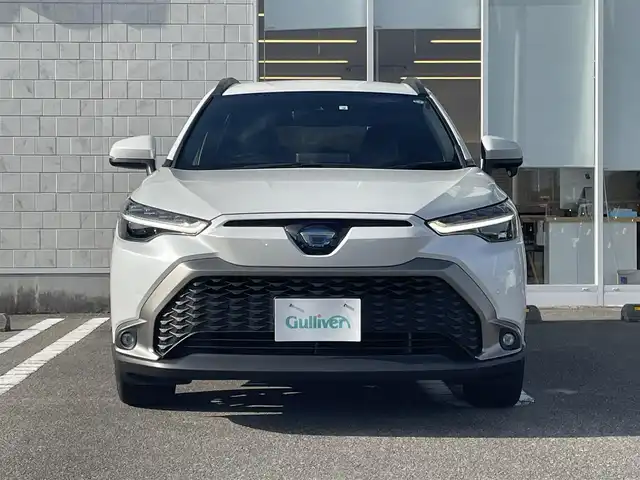 トヨタ カローラ クロス ハイブリッド Z 宮崎県 2022(令4)年 5万km プラチナホワイトパールマイカ 〇純正ディスプレイオーディオ/〇フルセグTV/○Bluetooth	/〇バックカメラ	/〇ETC	/〇ワンオーナー/〇プリクラッシュセーフティ	/〇レーントレーシングアシスト/〇レーダークルーズコントロール	/〇オートマチックハイビーム/〇ロードサインアシスト/〇パーキングサポートブレーキ/〇LEDヘッドランプ/〇LEDシーケンシャルターンランプ/〇LEDフロントフォグランプ/〇ルーフレール/〇リアスポイラー	/○オートマチックハイビーム	/〇オートライト				/〇純正18インチアルミ			/〇シートヒーター	/〇パワーシート/〇パワーバックドア	/〇左右独立温度調整オートエアコン	/〇スマートエントリー	/〇スタートシステム